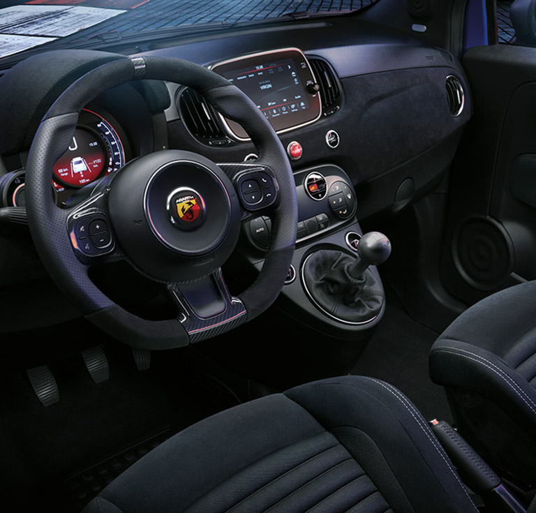 Abarth 500 interior with sport seats and Alcantara steering wheel